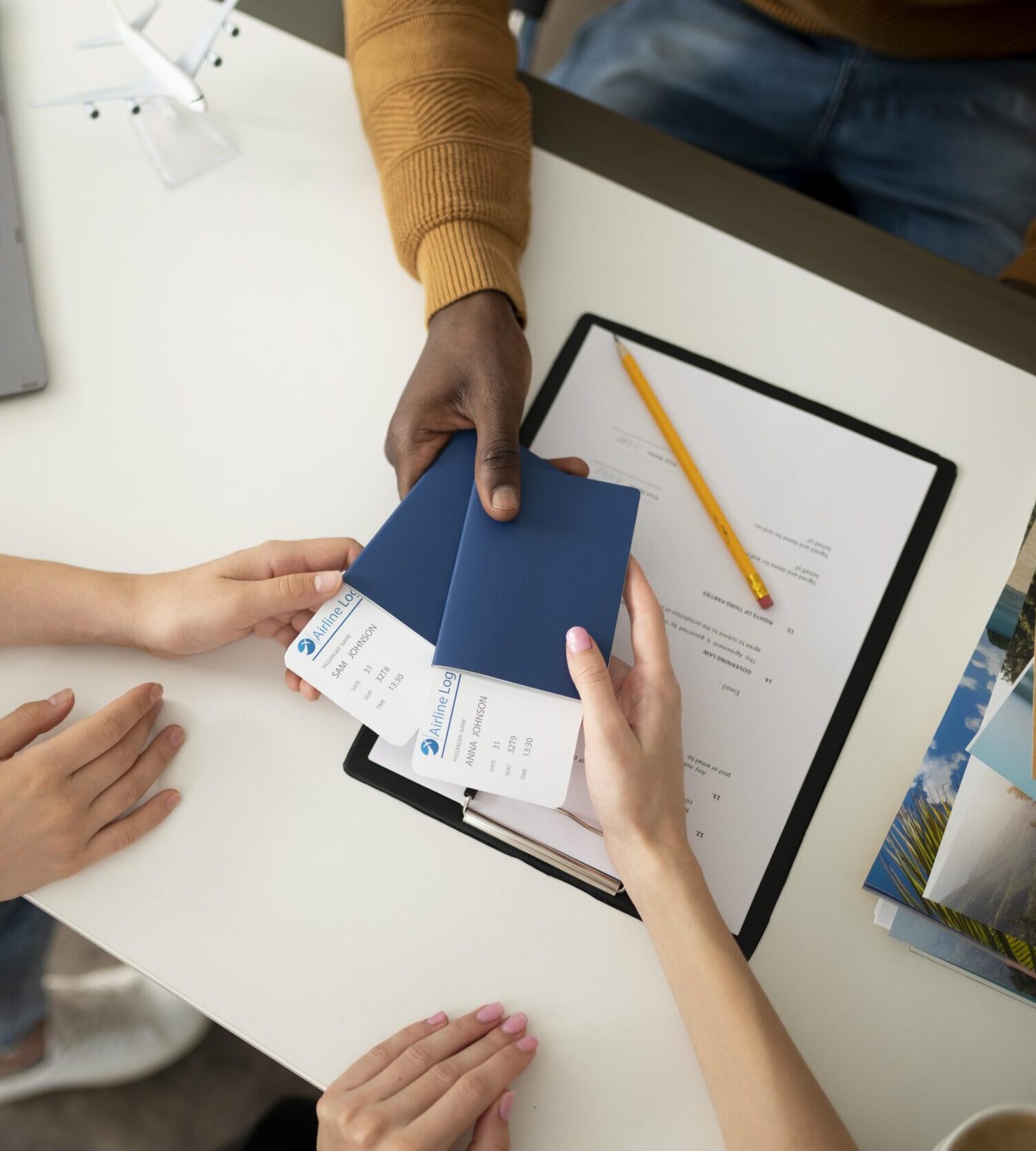 close up hands holding tickets scaled e1765894679434